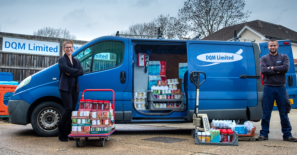 Vicki and Tim loading the van with donations for local charity food drop