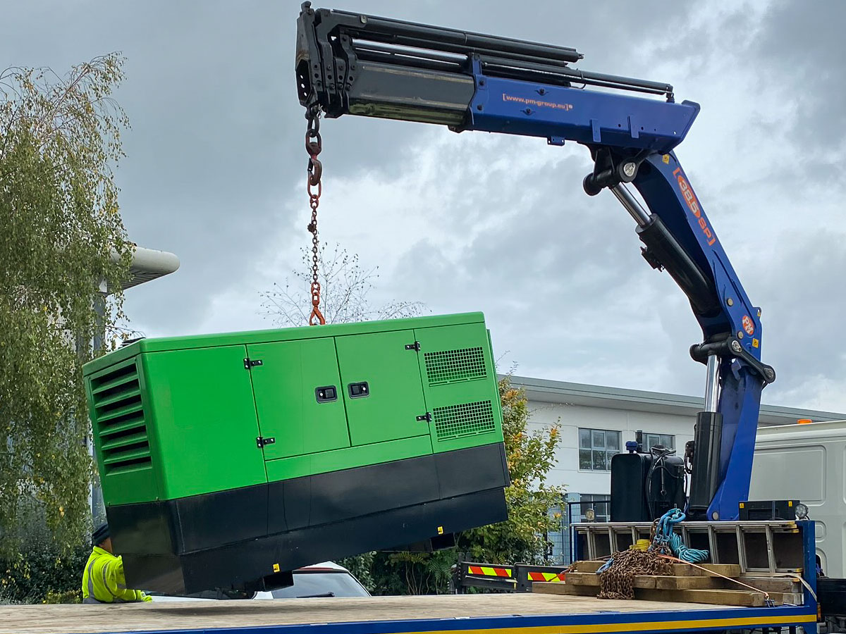 Green generator being relocated
