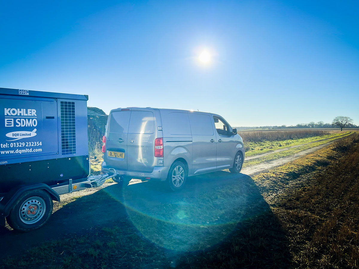 SDMO Generator on a trailer in a field
