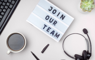Join our team sign on a desk